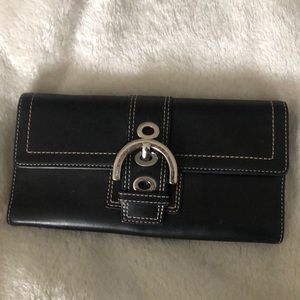 Black leather wallet with silver hardware